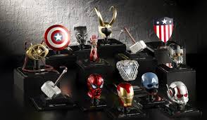 Illustrated museum prop wall of cinematic helmets and armor